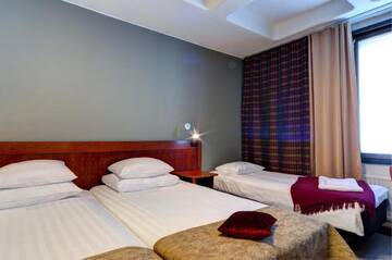 Фото номера Двухместный номер с 2 отдельными кроватями Отель Original Sokos Hotel Lappee г. Лаппеэнранта 10